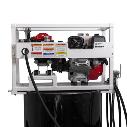 Minnich Multi-Purpose Sprayer rear view with safety labeling and hose connections
